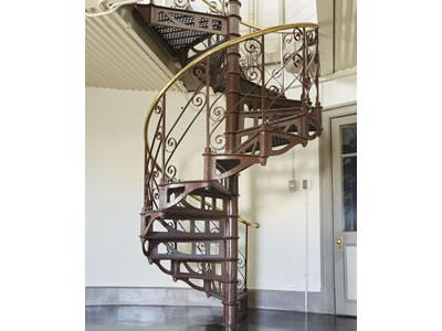 Image: steel-frame spiral stairway leading to the watchtower